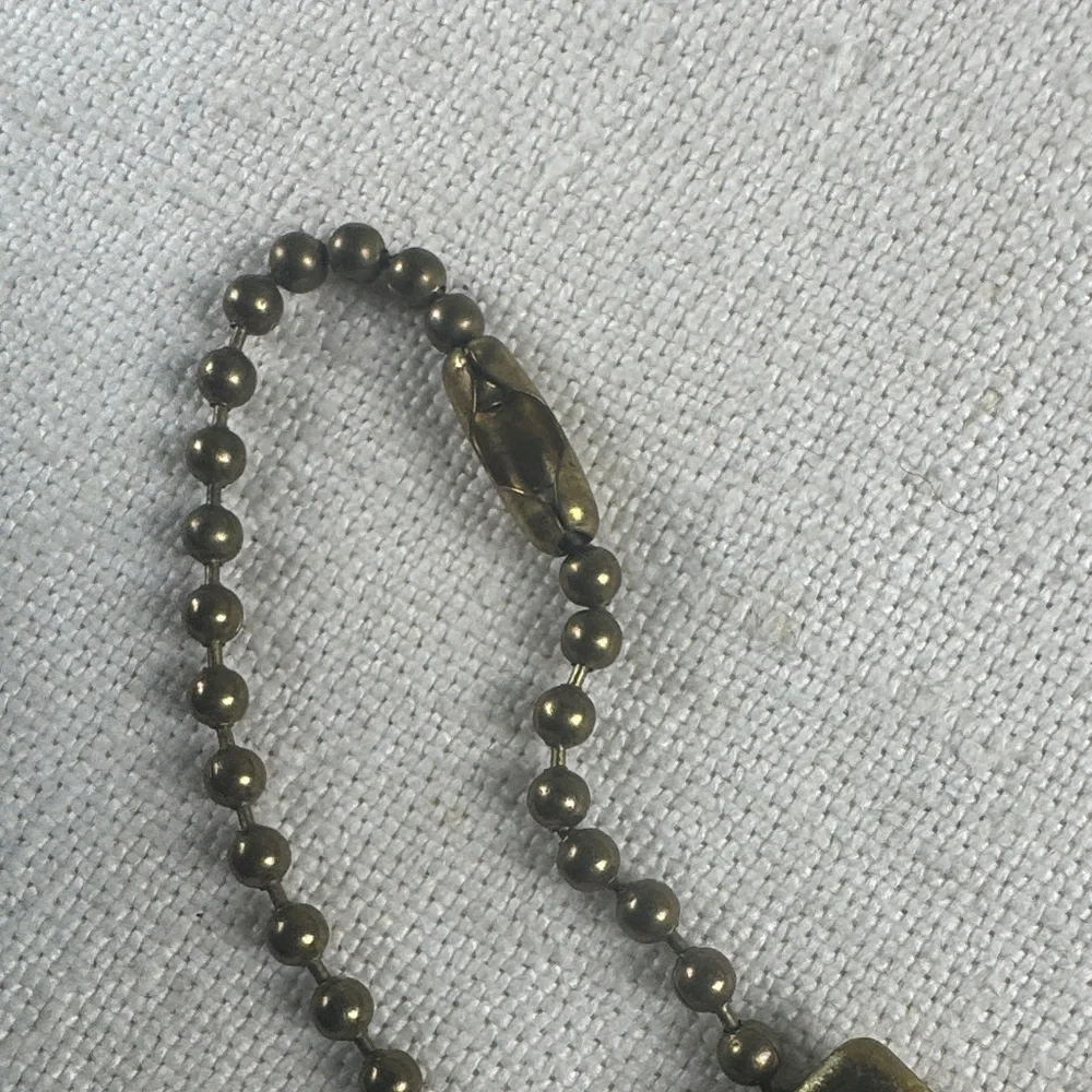 Letisse double sided gold bag charm tag